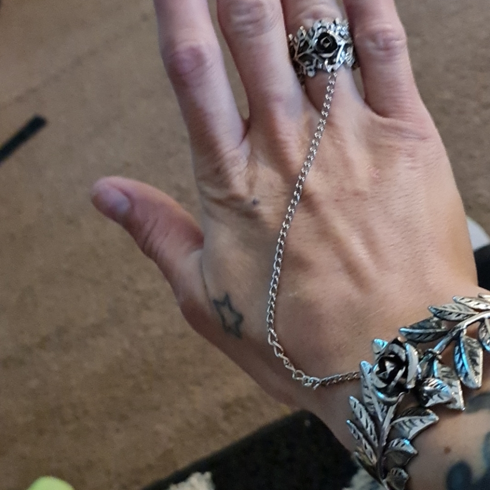 Rose bracelet with ring attached